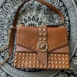 Michael Kors
Greenwich studded leather crossbody bag